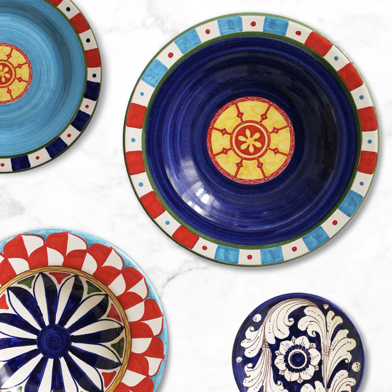 Sicily Paladini dinner, deep, salad, and dessert plates, inspired by Sicilian cart art, handmade ceramic craftsmanship, vibrant graphic designs, all-Italian masterpiece