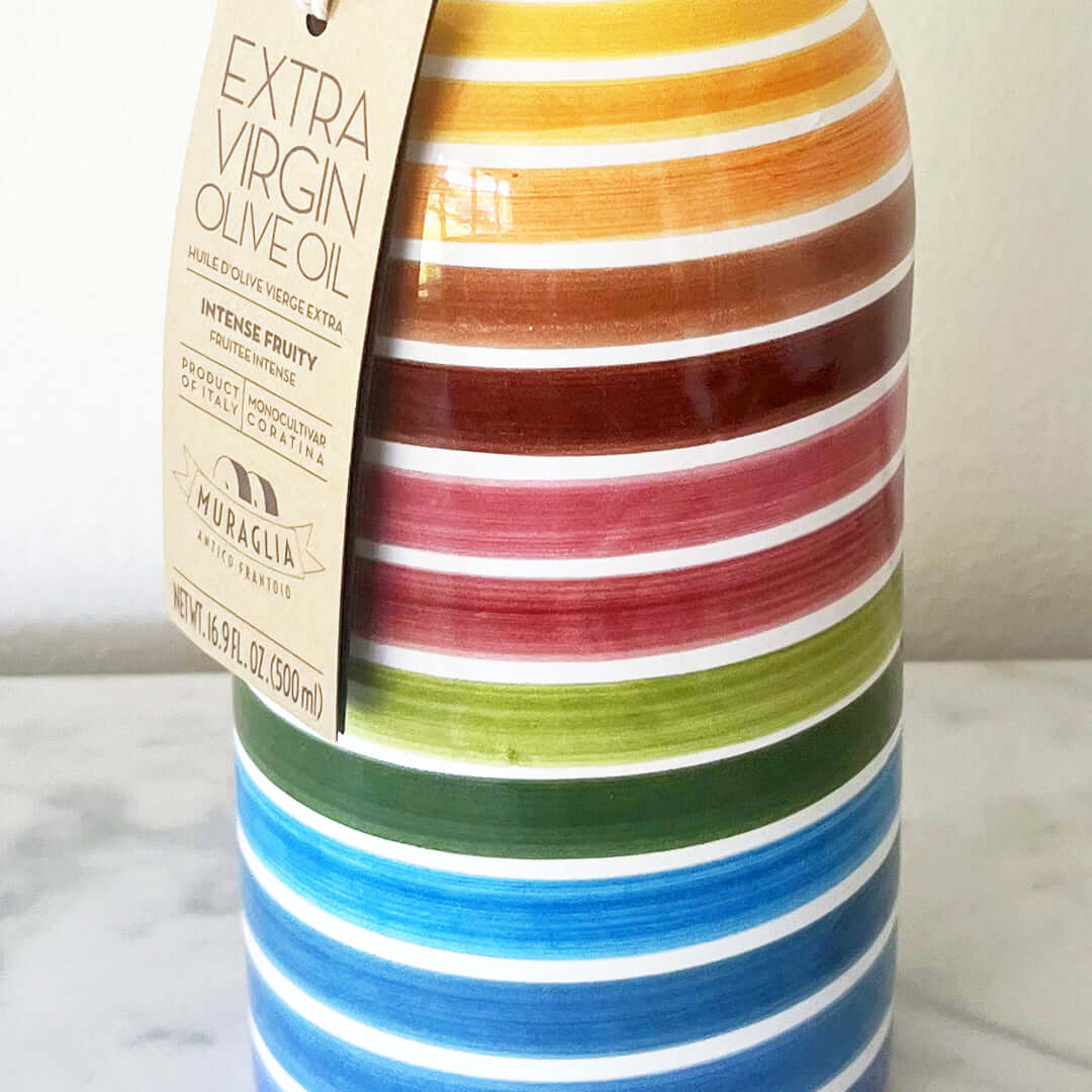 Handmade ceramic bottle with Italian extra virgin olive oil, crafted in Puglia. Hand painted rainbow design.